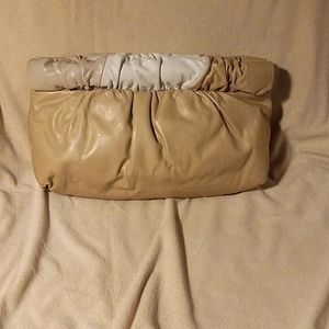 Morris Moskowitz tri colored taupe leather clutch.